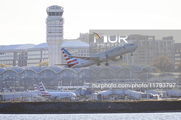 American Airlines Boeing 737 MAX 8 passenger aircraft spotted during takeoff and flying in front of the airport terminal, air traffic contro...