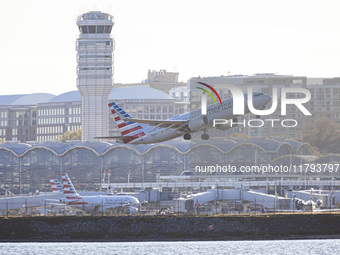 American Airlines Boeing 737 MAX 8 passenger aircraft spotted during takeoff and flying in front of the airport terminal, air traffic contro...