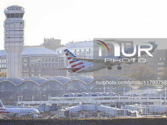 American Airlines Boeing 737 MAX 8 passenger aircraft spotted during takeoff and flying in front of the airport terminal, air traffic contro...