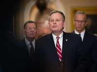 Sen. Steve Daines (R-MT) speaks during Senate Republicans' weekly press conference outside the Senate chamber, in Washington, November 19, 2...