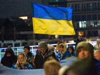 Two hundred people take part in a demonstration to mark 1,000 days since the full-scale war between Ukraine and Russia in Cologne, Germany,...