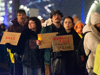 Two hundred people take part in a demonstration to mark 1,000 days since the full-scale war between Ukraine and Russia in Cologne, Germany,...