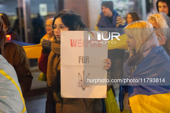 Two hundred people take part in a demonstration to mark 1,000 days since the full-scale war between Ukraine and Russia in Cologne, Germany,...