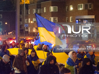 Two hundred people take part in a demonstration to mark 1,000 days since the full-scale war between Ukraine and Russia in Cologne, Germany,...