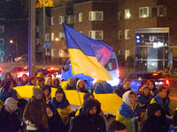 Two hundred people take part in a demonstration to mark 1,000 days since the full-scale war between Ukraine and Russia in Cologne, Germany,...