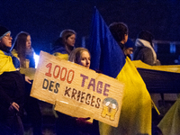 Two hundred people take part in a demonstration to mark 1,000 days since the full-scale war between Ukraine and Russia in Cologne, Germany,...