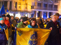 Two hundred people take part in a demonstration to mark 1,000 days since the full-scale war between Ukraine and Russia in Cologne, Germany,...