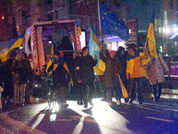 Two hundred people take part in a demonstration to mark 1,000 days since the full-scale war between Ukraine and Russia in Cologne, Germany,...