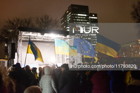 Two hundred people take part in a demonstration to mark 1,000 days since the full-scale war between Ukraine and Russia in Cologne, Germany,...