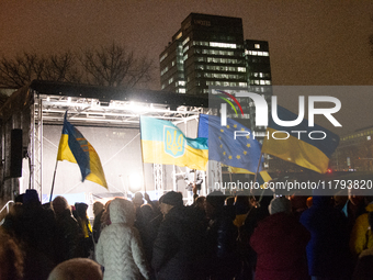 Two hundred people take part in a demonstration to mark 1,000 days since the full-scale war between Ukraine and Russia in Cologne, Germany,...