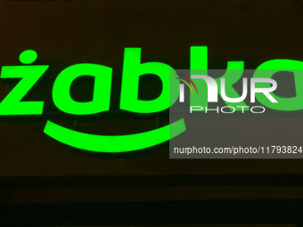 Zabka logo on a store store in Torun, Poland on November 19, 2024. (