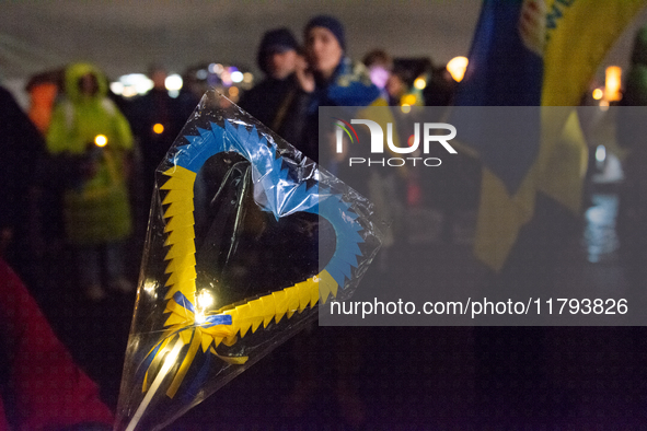 Two hundred people take part in a demonstration to mark 1,000 days since the full-scale war between Ukraine and Russia in Cologne, Germany,...