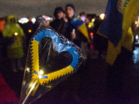 Two hundred people take part in a demonstration to mark 1,000 days since the full-scale war between Ukraine and Russia in Cologne, Germany,...