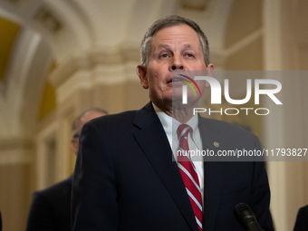 Sen. Steve Daines (R-MT) speaks during Senate Republicans' weekly press conference outside the Senate chamber, in Washington, November 19, 2...