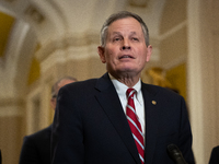 Sen. Steve Daines (R-MT) speaks during Senate Republicans' weekly press conference outside the Senate chamber, in Washington, November 19, 2...