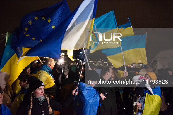 Two hundred people take part in a demonstration to mark 1,000 days since the full-scale war between Ukraine and Russia in Cologne, Germany,...