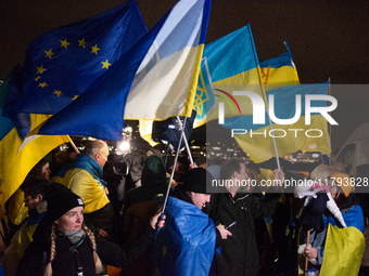 Two hundred people take part in a demonstration to mark 1,000 days since the full-scale war between Ukraine and Russia in Cologne, Germany,...