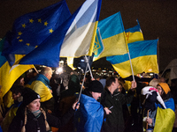 Two hundred people take part in a demonstration to mark 1,000 days since the full-scale war between Ukraine and Russia in Cologne, Germany,...