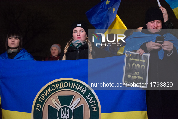 Two hundred people take part in a demonstration to mark 1,000 days since the full-scale war between Ukraine and Russia in Cologne, Germany,...