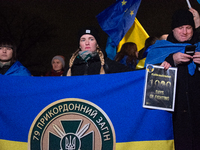 Two hundred people take part in a demonstration to mark 1,000 days since the full-scale war between Ukraine and Russia in Cologne, Germany,...