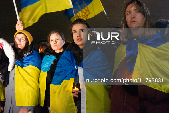 Two hundred people take part in a demonstration to mark 1,000 days since the full-scale war between Ukraine and Russia in Cologne, Germany,...