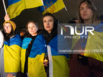 Two hundred people take part in a demonstration to mark 1,000 days since the full-scale war between Ukraine and Russia in Cologne, Germany,...