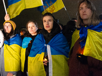 Two hundred people take part in a demonstration to mark 1,000 days since the full-scale war between Ukraine and Russia in Cologne, Germany,...