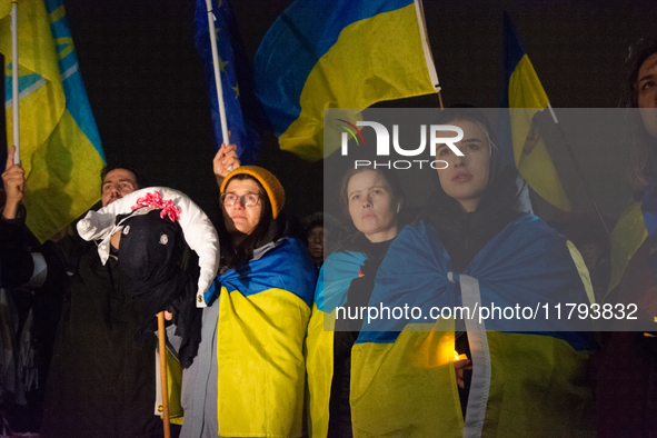 Two hundred people take part in a demonstration to mark 1,000 days since the full-scale war between Ukraine and Russia in Cologne, Germany,...