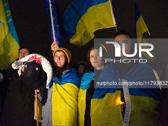 Two hundred people take part in a demonstration to mark 1,000 days since the full-scale war between Ukraine and Russia in Cologne, Germany,...