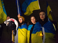 Two hundred people take part in a demonstration to mark 1,000 days since the full-scale war between Ukraine and Russia in Cologne, Germany,...