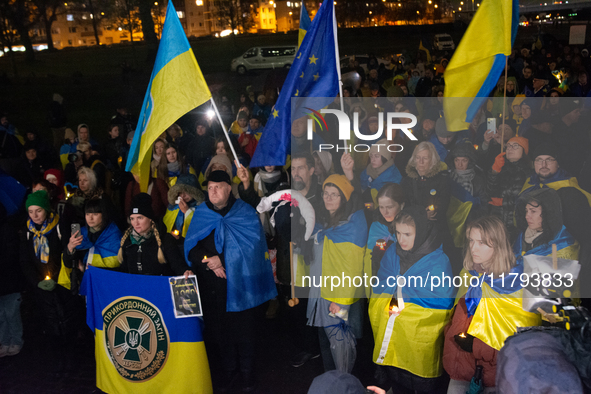 Two hundred people take part in a demonstration to mark 1,000 days since the full-scale war between Ukraine and Russia in Cologne, Germany,...