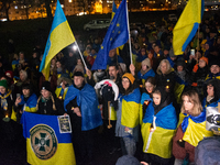 Two hundred people take part in a demonstration to mark 1,000 days since the full-scale war between Ukraine and Russia in Cologne, Germany,...