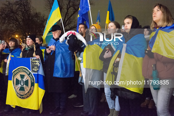 Two hundred people take part in a demonstration to mark 1,000 days since the full-scale war between Ukraine and Russia in Cologne, Germany,...