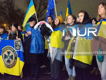 Two hundred people take part in a demonstration to mark 1,000 days since the full-scale war between Ukraine and Russia in Cologne, Germany,...