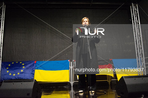 Mona Neubaur, NRW state minister of economy, speaks on the stage as two hundred people take part in a demonstration to mark 1000 days since...