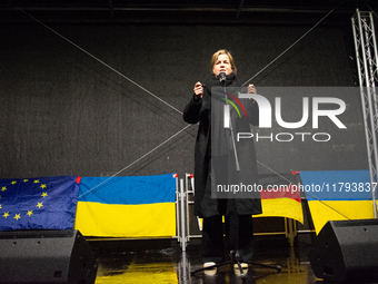 Mona Neubaur, NRW state minister of economy, speaks on the stage as two hundred people take part in a demonstration to mark 1000 days since...