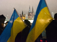 Two hundred people take part in a demonstration to mark 1,000 days since the full-scale war between Ukraine and Russia in Cologne, Germany,...