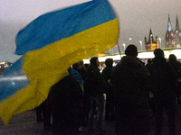 Two hundred people take part in a demonstration to mark 1,000 days since the full-scale war between Ukraine and Russia in Cologne, Germany,...