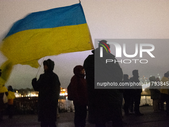 Two hundred people take part in a demonstration to mark 1,000 days since the full-scale war between Ukraine and Russia in Cologne, Germany,...