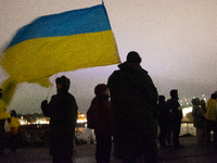 Two hundred people take part in a demonstration to mark 1,000 days since the full-scale war between Ukraine and Russia in Cologne, Germany,...