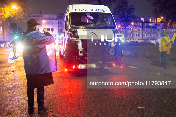 A destroyed medical vehicle is displayed as two hundred people march in silence to mark 1000 days since the full-scale war between Ukraine a...