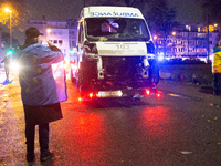 A destroyed medical vehicle is displayed as two hundred people march in silence to mark 1000 days since the full-scale war between Ukraine a...