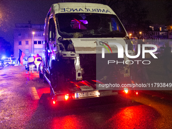 A destroyed medical vehicle is displayed as two hundred people march in silence to mark 1000 days since the full-scale war between Ukraine a...