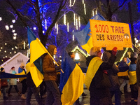 Two hundred people take part in a demonstration to mark 1,000 days since the full-scale war between Ukraine and Russia in Cologne, Germany,...