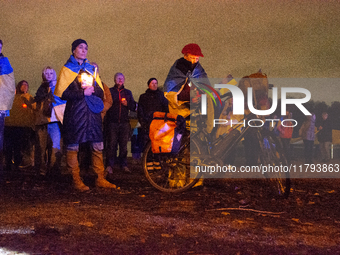 Two hundred people take part in a demonstration to mark 1,000 days since the full-scale war between Ukraine and Russia in Cologne, Germany,...