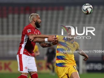 Enrico Pepe of Malta vies for the ball with Albert Rosas of Andorra during the UEFA Nations League, League D, Group D2 soccer match between...