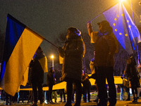 Two hundred people take part in a demonstration to mark 1,000 days since the full-scale war between Ukraine and Russia in Cologne, Germany,...