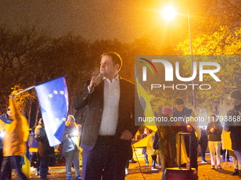 Nathanael Liminski, the state minister of international affairs, speaks to the protesters as two hundred people take part in a demonstration...