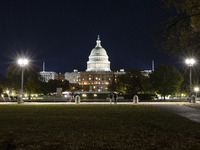 Night view of the illuminated US Capitol, the seat of the United States Congress with the United States Senate and the US House of Represent...