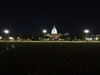 Night view of the illuminated US Capitol, the seat of the United States Congress with the United States Senate and the US House of Represent...